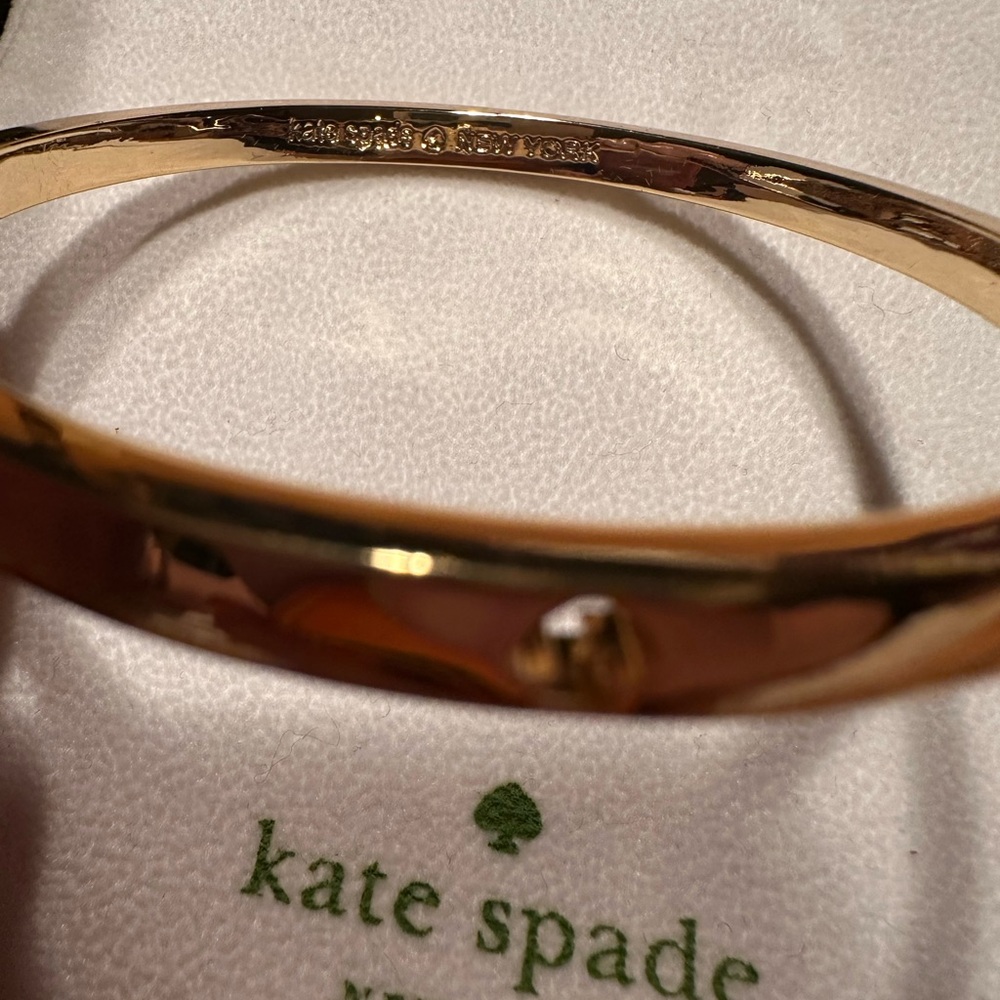 NWOT Gold Kate Spade Bangle
Bracelet + Dustbag - Picture 6 of 7